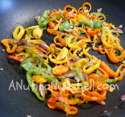 thinly sliced peppers sauteed