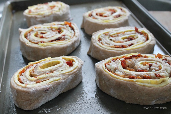 flatbread breakfast pinwheels on cookie sheet